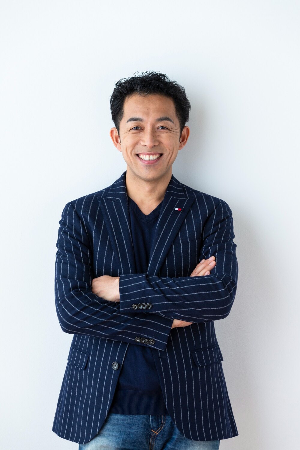ジャケット姿のランナーズエイド院長 後藤健良